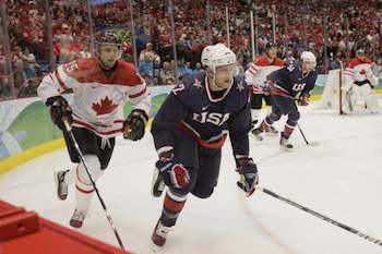 2010 Vancouver Winter Olympic Games: Men's Hockey - Canada Claims Gold with 3-2 OT Victory over U.S. 2010 WINTER OLYMPIC GAMES -- Men's Hockey Gold Medal Game - USA versus Canada -- Pictured: (l-r) Dany Heatley of Canada, Ryan Malone of Team USA -- Photo by: Paul Drinkwater/NBC