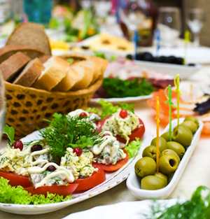 Be buffet smart, taking only one-bite portions of the foods you really want. Move away from the buffet to curb subconscious nibbling