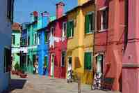 Pastel houses line the streets of Burano, an island in Venice's lagoon.