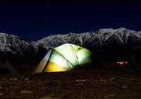 A group of campers makes a home under the stars of the California sky