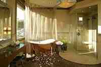 The difference between a mere bath and the ultimate home spa is atmosphere. Like a day spa, your home spa should create instant relaxation when you enter