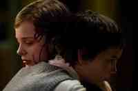 Chloe Grace Moretz & Kodi Smit-McPhee  in the movie Let Me In
