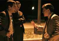 Matt Damon & Scott Bakula in the movie The Informant