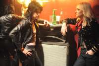 Kristen Stewart &  Dakota Fanning in the movie The Runaways