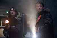 Mary Elizabeth Winstead and Joel Edgerton in The Thing