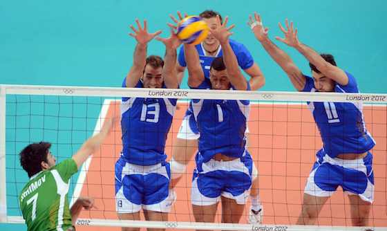 Italy's Dragan Travica, Luigi Mastrangelo and Cristian Savani put up a triple block against Bulgaria