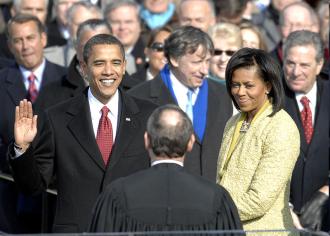With his family by his side, Barack Obama is sworn in as the 44th president of the United States by Chief Justice of the United States John G. Roberts Jr. in Washington, D.C., Jan. 20, 2009. More than 5,000 men and women in uniform are providing military ceremonial support to the presidential inauguration, a tradition dating back to George Washington's 1789 inauguration. (DoD photo by Master Sgt. Cecilio Ricardo, U.S. Air Force/Released)