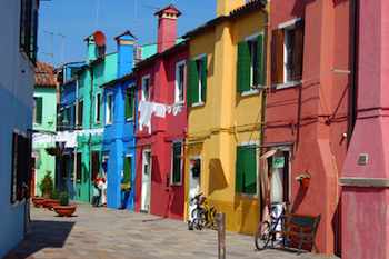 Pastel houses line the streets of Burano, an island in Venice's lagoon.