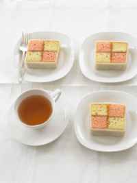 Afternoon Tea Revival Recipes. The pink-and-white (or yellow) Battenberg Cake was created in 1884 to honor the marriage of Queen Victoria's granddaughter to German Prince Louis of Battenberg.