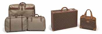 The three vintage Gucci suitcases at left sold for $854 recently at Bonhams. Two Vuitton bags (at right) brought $1,159. Photos courtesy of Bonhams