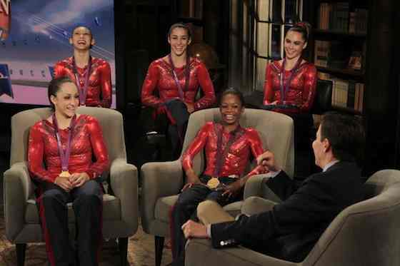 US Women's Gymnasts -- Pictured: (l-r) Kyla Ross, Jordyn Wieber, Aly Raisman, McKayla Maroney, Gabby Douglas, Bob Costas -- (Photo by: Paul Drinkwater/NBC)