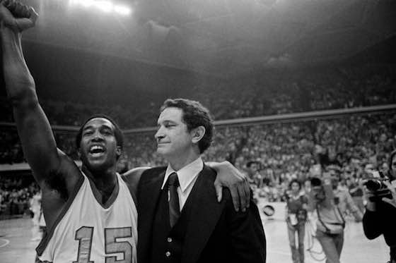 Former Marquette standout Butch Lee (left) celebrates with head coach Al McGuire.