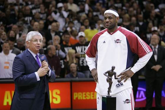 Former NBA Commissioner David Stern, left, presents LeBron James with the 2008-09 MVP trophy.
