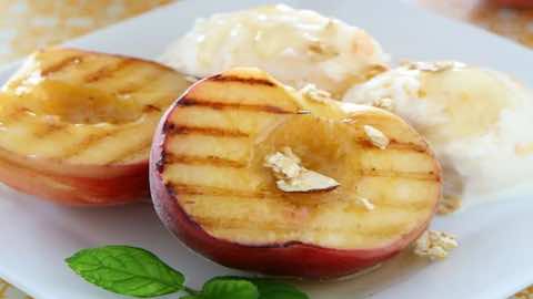 Ginger-Spiced Grilled Peaches with Ice Cream & Crushed Raspberries
