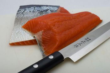 Use whole fillets with the skin, which helps hold the fish together during the curing process and makes slicing easier