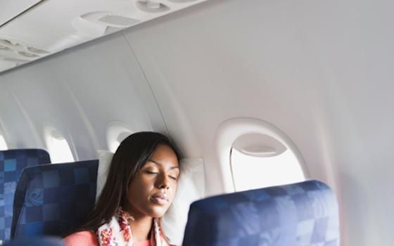 How to Catch Some Zzzzs on Your Next Flight