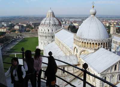 Climb the Leaning Tower's 294 steps for a breathtaking view of Pisa's cathedral, baptistery, and beyond