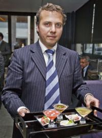 May Fair Bar Manager Marios Elias serves signature collection of flavored martinis. Photographer	Steve Haggerty/ColorWorld