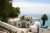 Sidi Bou Said is a colorful resort that resembles a Greek island with whitewashed homes and brightly colored windows and doors.