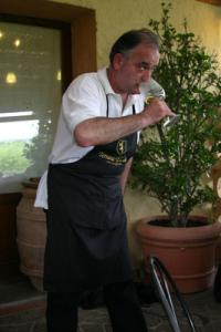 At Tenuta Torciano, a farmhouse/winery near San Gimignano, Pierluigi Giach provides wine tasting 