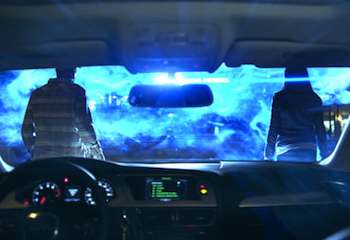 Eric Balfour & Scottie Thompson in the movie Skyline