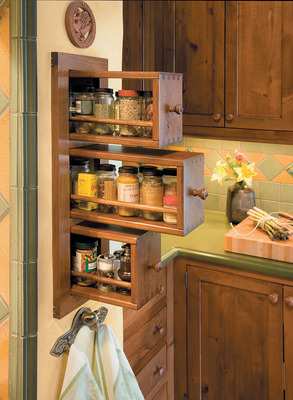 Home Decor - Custom Cabinetry Can Solve Difficulties. Specially designed cabinetry, such as this pullout spice rack, can serve the needs of those with limited reach or mobility difficulties