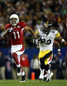 2:47 left in game Warner hits Fitzgerald with short pass over middle that speedster took all the way for 64-yard touchdown to shockingly lift Arizona into 23-20 lead Cardinals Steelers Super Bowl XLIII Tampa Bay Florida February 1, 2009