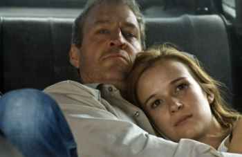 David Roberts & Claire van der Boom in the movie The Square