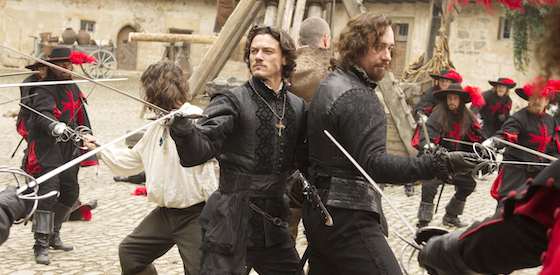Logan Lerman and Milla Jovovich in The Three Musketeers