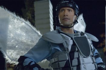 Dwayne Johnson & Ashley Judd in the movie The Tooth Fairy