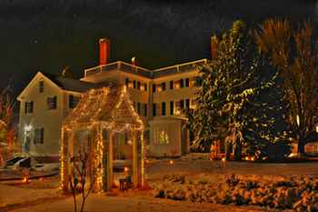 The Victorian Goodwin House and gardens with magical holiday lights at Strawbery Banke
