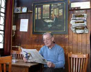 The current proprietor of one of the city's oldest bruine cafes, Papeneiland Pub, No. 2 Prinsengracht, mimics the painting in the cafe.