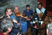 Dingle's Irish pubs everyone is a friend, and the music and beer, Guinness of course, carbonate the lively fun