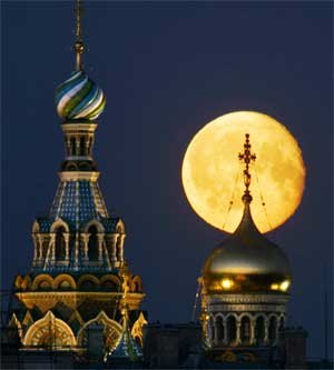 Full moon rises above St. Petersburg Russia