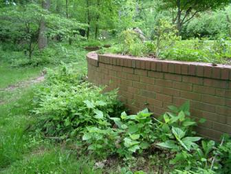 Ask the Builder by Tim Carter. This retaining wall was built with lots of care and skill. It is still perfect after 20 years of harsh weather. Photographer - Tim Carter